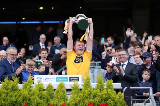 Saffrons skipper Eoghan Campbell holds aloft the Joe McDonagh Cup following victory over Kerry.