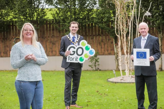 Pictured with Stephanie Allen is Councillor Chris Smyth, Chairman of Fermanagh and Omagh District Council (centre) and Nicholas O’Shiel, Chief Executive of Omagh Enterprise.