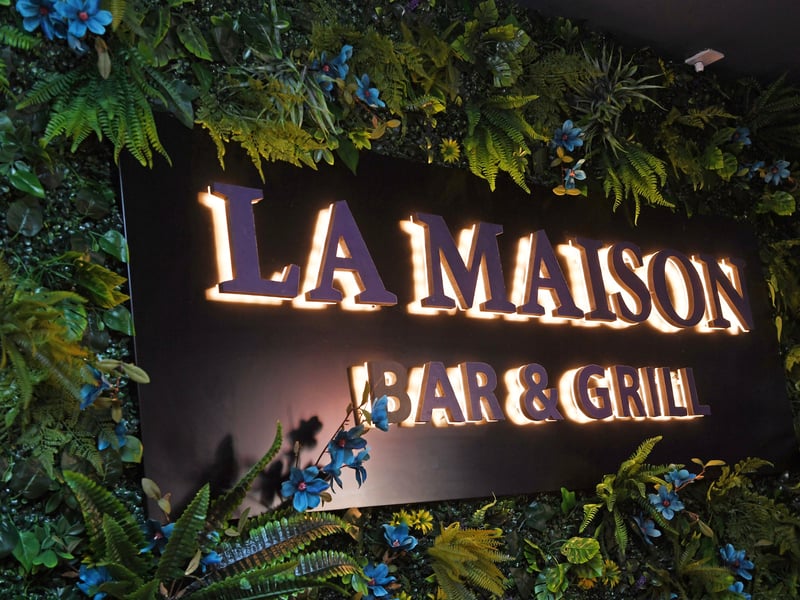 The menu features meat platters, hotdogs, burgers and steaks alongside wraps and vegetarian options.