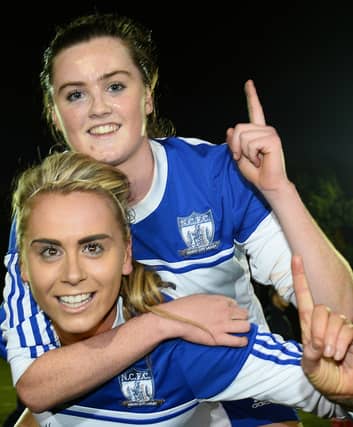 Dual star Aimee Mackin celebrates soccer success with Newry City Ladies.