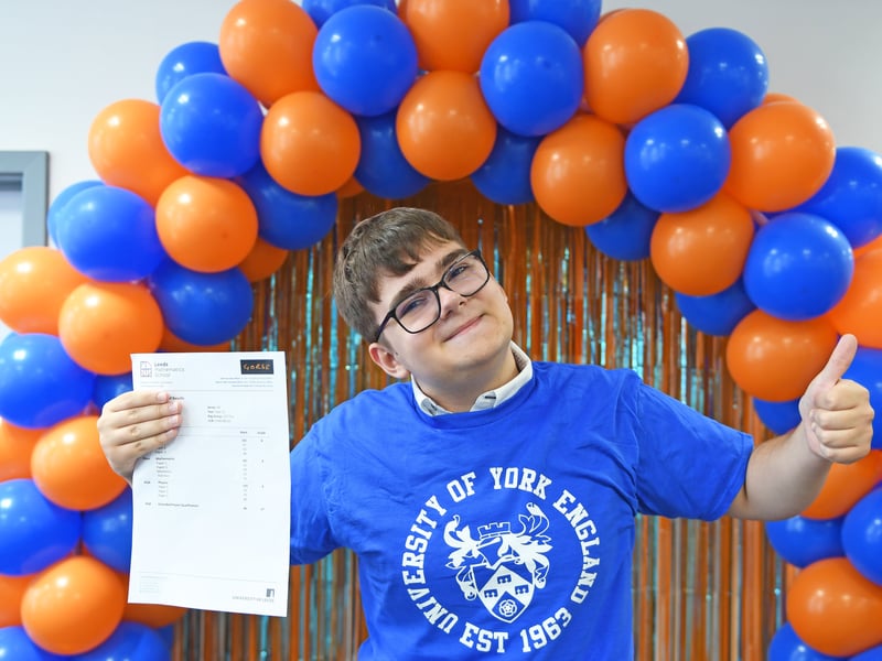 Przemek Lisicki celebrating his results - three Bs in chemistry, physics and maths, and an A* in his Extended Project Qualification (EPQ). He's the first student at Leeds Mathematics School to complete an EPQ. 