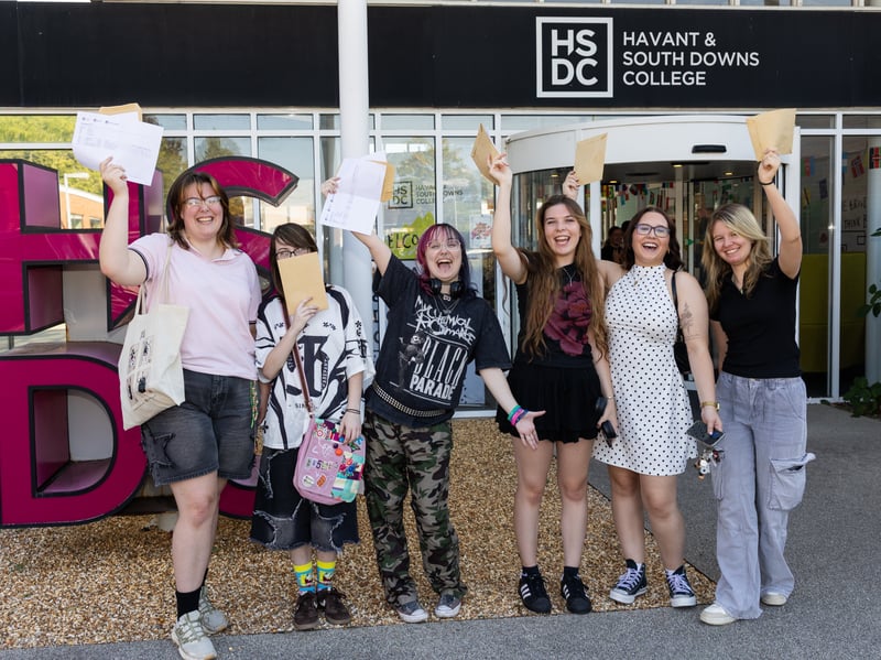 Students celebrate collecting their A-level results at HSDC on Thursday, August 13