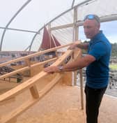 Máirtín Seoighe pictured in the polytunnel with the currachs