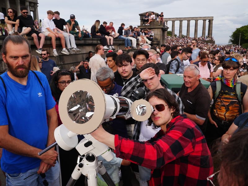 Hundreds of people gathered on Calton Hill.