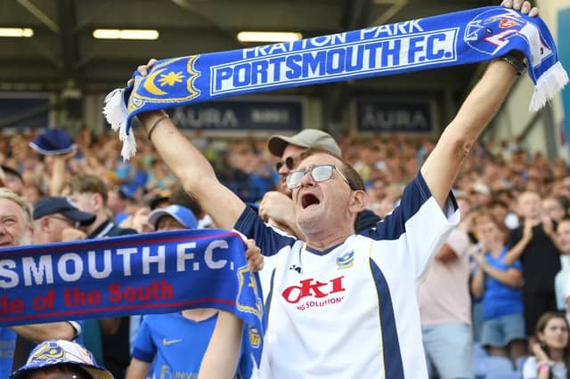 Cracking photos as 20,479 supporters pack-out Fratton Park for Pompey's Championship opener against QPR on Saturday.