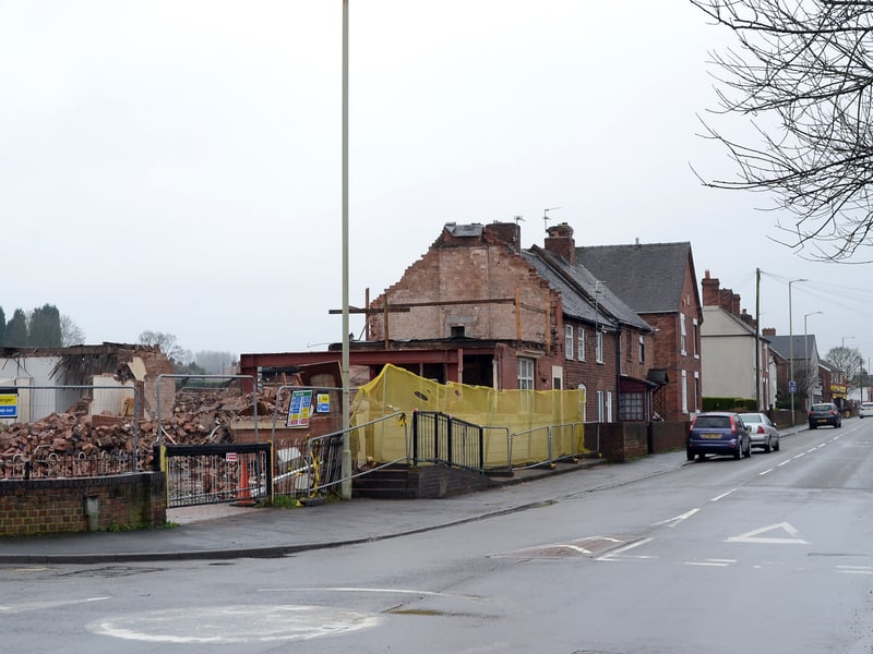 Demolition nearly complete at the Old Shawbirch pub. It's Boxing Day, Thursday, December 26, 2019, so nobody is at work. It was already boarded up by February 2012 after which, according to local councillors, it became the target of vandals, anti-social behaviour, and squatters. Currently the empty site remains boarded up and overgrown.