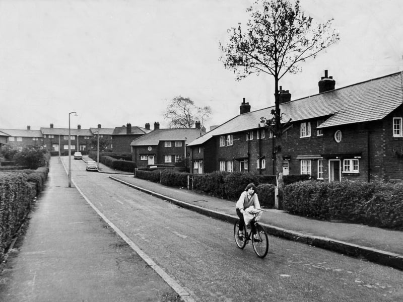 A cyclist pedals through the council estate in Kirkstall, Leeds, in October 1968