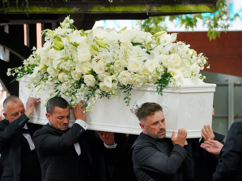 The coffin is taken into Swansea Minster for the funeral of Bonnie Tyler. 