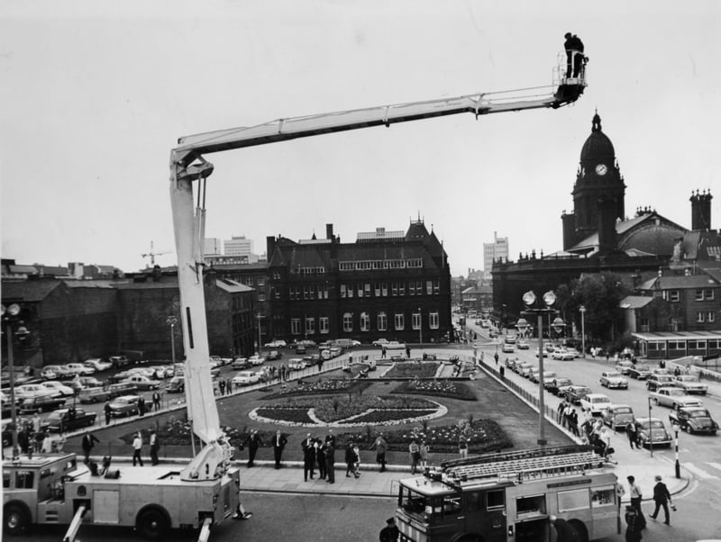 Firefighters demonstrate their new hydraulic platform, which can reach up to 85ft high, outside the Civic Hall in Leeds city centre in July 1969