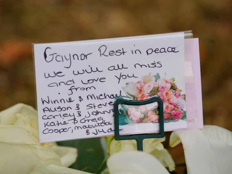A message left on floral tributes outside  Swansea Minster for the funeral of Bonnie Tyler. 