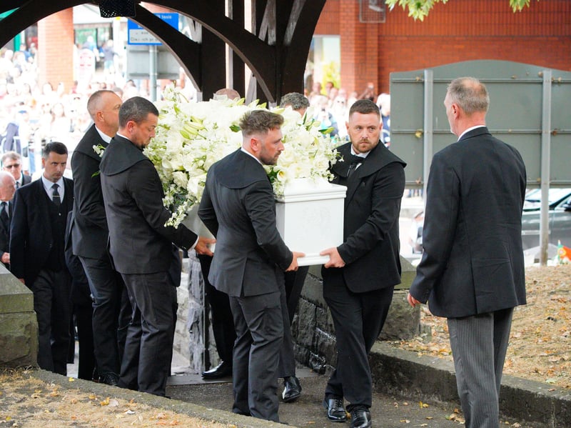 The coffin is taken into Swansea Minster for the funeral of Bonnie Tyler.