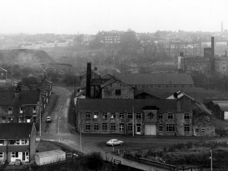 The junction of Pudsey Road, Hough Tree Road and Wood Lane. House End Mills in foreground on the corner of Pudsey Road and Hough Tree Road. Pictured in December 1968.