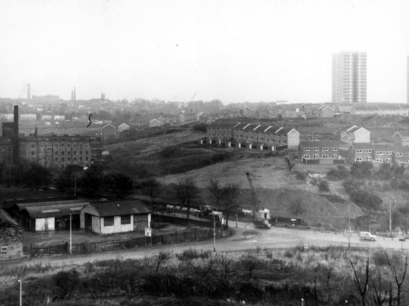 The junction of Pudsey and Ring Road Bramley. Gamble Hill estate in the background to the right. Hough End visible to the left. Pictured in December 1968.