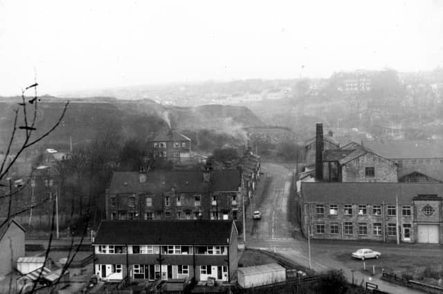 An elevated view of the junction of Pudsey Road, Wood Lane and Hough Tree Road. On the right is Boyes and Hallawell Ltd. woollen manufacturers in Hough End Mills. Pictured in December 1968.