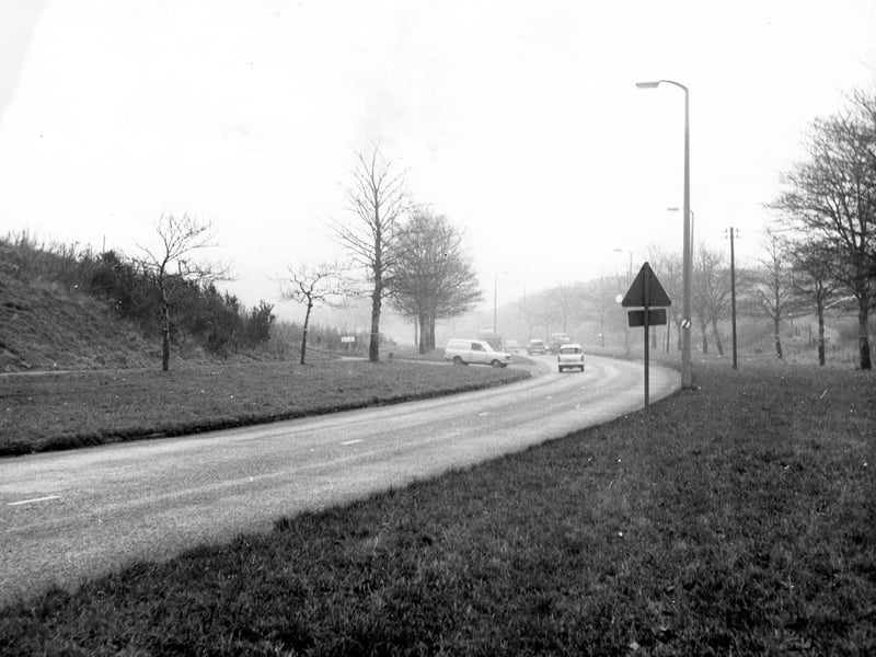 Looking east along Ring Road Bramley, with Spring Valley Crescent joining from the left.