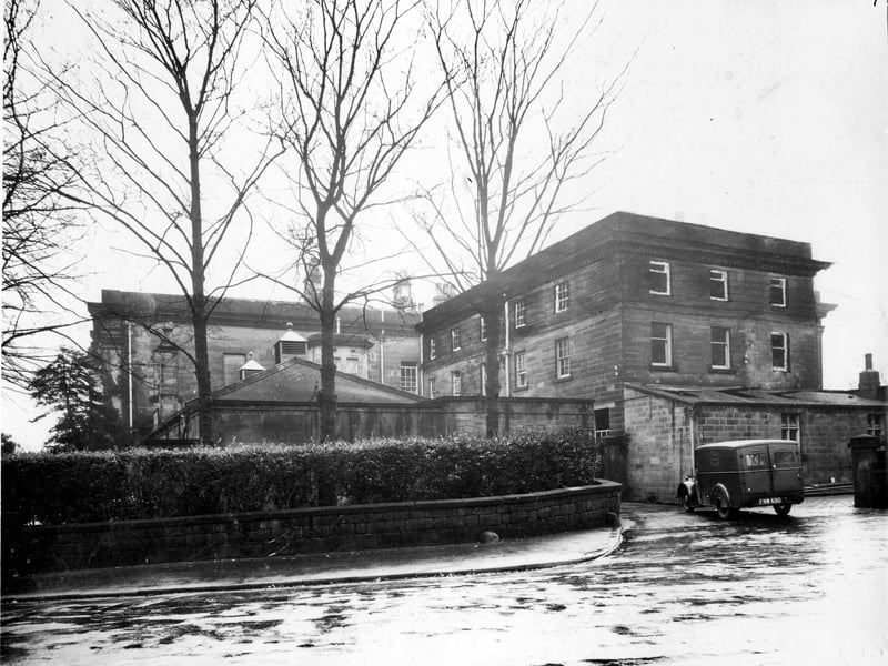 The rear of the Mansion, seen from Mansion Lane in December 1938. The right wing of the house has been superimposed with an extra floor in this view to give an artists impression of how alterations would appear. A van belonging to the Gilpin catering company can be seen.