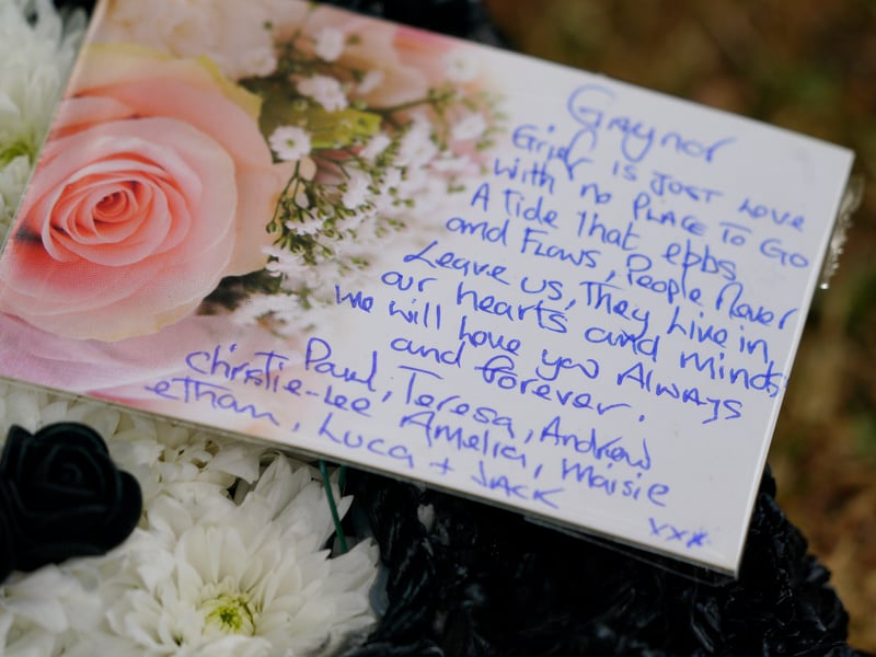 A message left on floral tributes outside Swansea Minster for the funeral of Bonnie Tyler.
