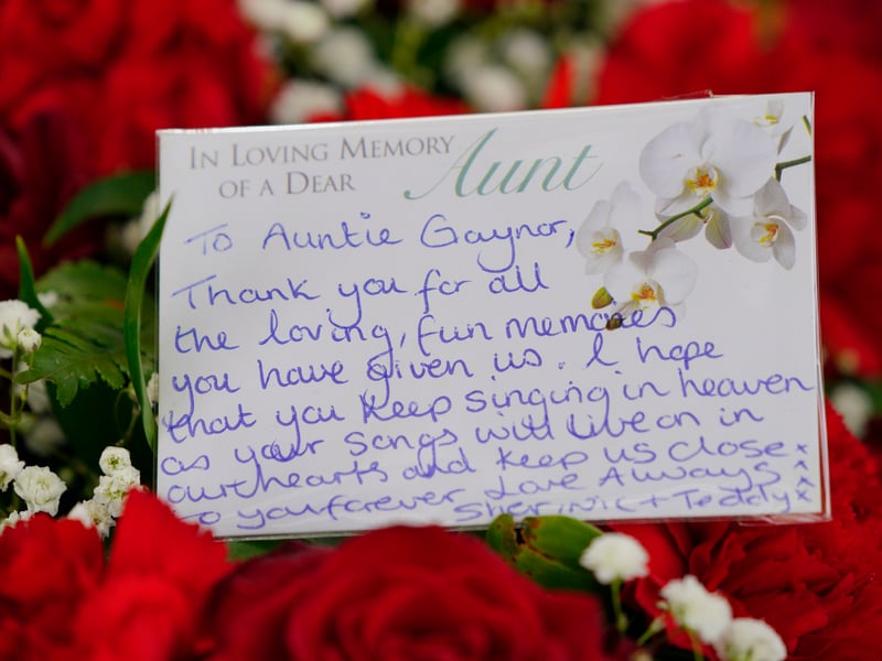 A message left on floral tributes outside  Swansea Minster for the funeral of Bonnie Tyler. 