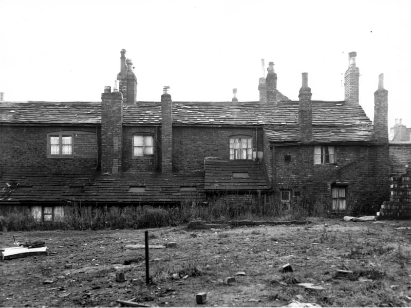 Rear view of properties on Second Fold off Chapel Lane. Numbers 28 to 34 run from left to right. Properties were included in the Armley slum clearance areas. Pictured in December 1967.