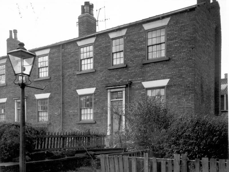 Two properties on Roger's Place off Chapel Lane, number 4 is to the left, number 3 to the right. Properties have gardens to the front and are also due for demolition as part of Armley's slum clearance programme.