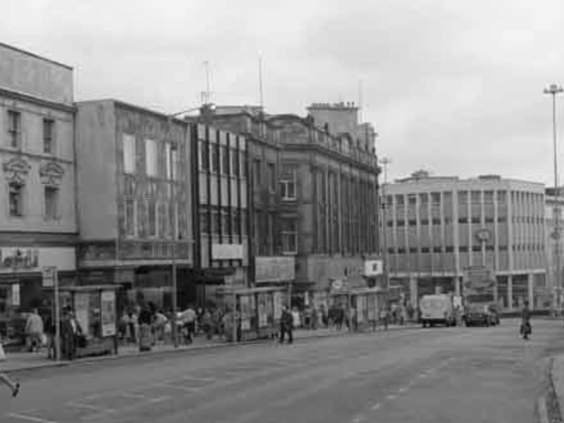 High Street, Sheffield, pictured sometime during the 1980s or 90s, showing stores including Manfield and Sons shoe shop, and C&A fashion shop