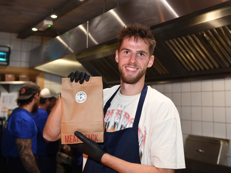 Anton Stach shows off his new burger at Meat Stack
