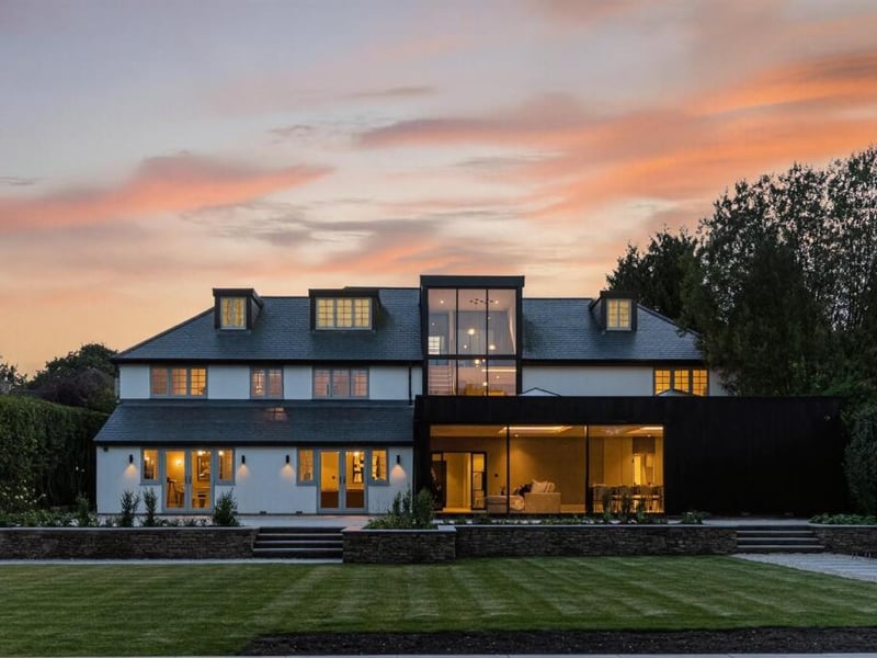 Eight bedrooms, five bathrooms, 6,682 sq ft.