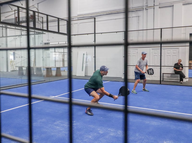 A padel game underway at Padel Quarter.