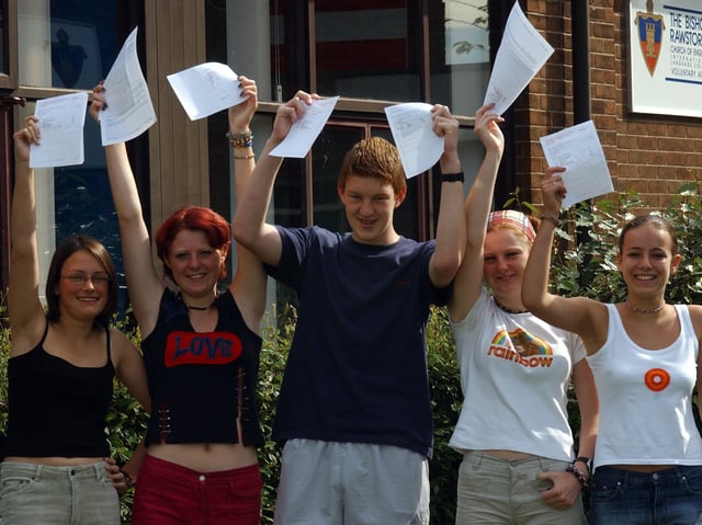 Bishop Rawsthorne International College students in Croston near Preston, from left, Joanne Chicken, Jill Ormesher, Joseph Bradshaw, Fay Ormesher and Gisela Carr with their GCSE results in 2002.