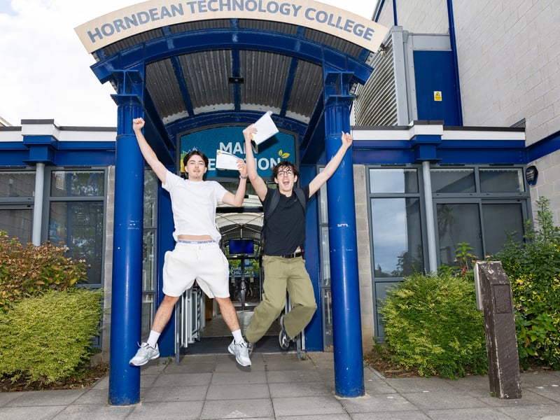 GCSE results day at Horndean Technology College.

Pictured: Jamie Gauntlet and Oliver Smith 

Picture: Marcin Jedrysiak