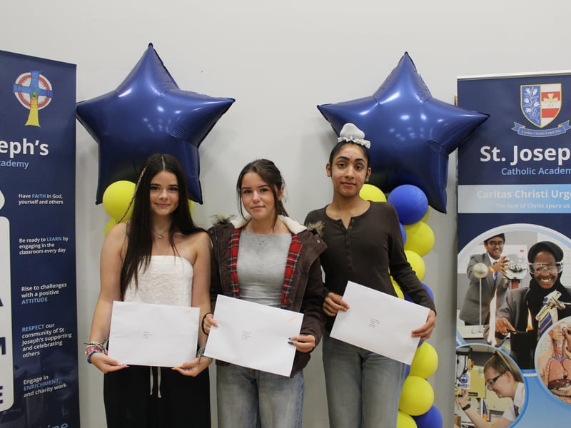 St Joseph's Catholic Academy pupils Hartegh, Katie and Emily with their GCSE results.