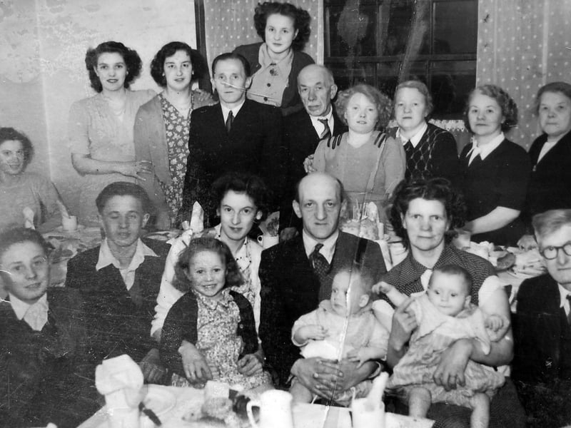 This was found on a grass verge by the roadside in the Battlefield area of Shrewsbury, happily sealed in a polythene bag which meant that it had not suffered from the ravages of the weather. It is a professionally taken photo, and handwritten on the back is: "21st birthday party, April 7th, 1951." Our best guess at the photographer's stamp, which is very faint, is "C & F McKean, Photographers, 13 Bridge Street." Those are your clues. Who are they? Whose birthday is it? How did the photo end up on a grass verge?
