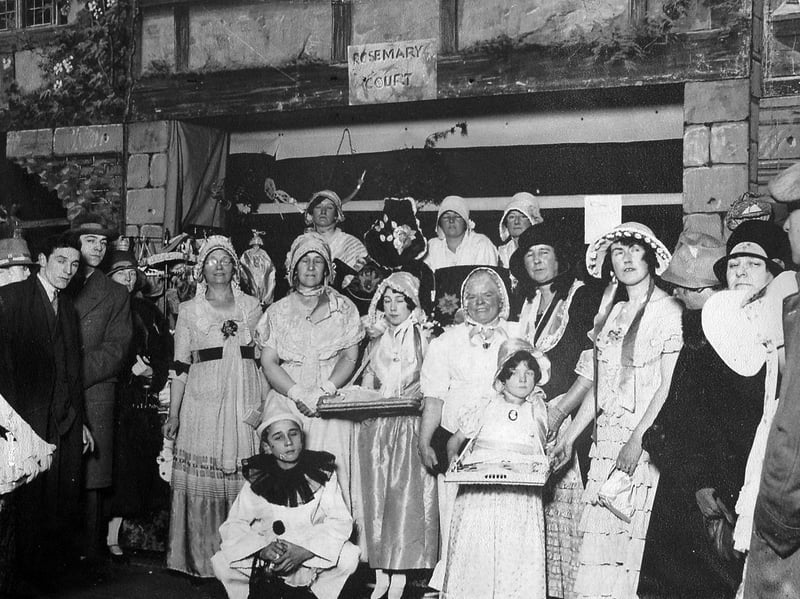 An unknown Shrewsbury drama production, perhaps in the 1930s. The sign on the lintel is "Rosemary Court," but then it's only a prop.
