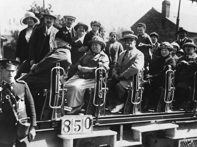 David Hughes was trying to find out more about this. The lady second from the left in the foreground, that is, sitting immediately behind the lady with the black hat at the front, is David's grandmother and he believed the man behind smoking a cigarette is his grandfather. "My grandfather was a prison officer at Shrewsbury Prison and they all lived at 109 St Michael Street, Shrewsbury," he told us. "I'm just hoping some historian may recognise the type of transport and deduce where it operated."