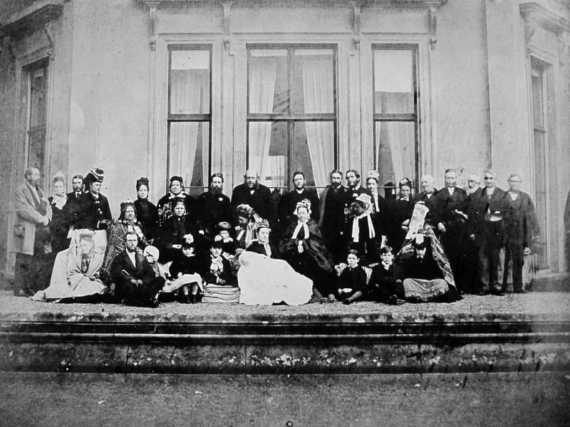 We were sent this by David Morris, from Calgary, Canada, in 2012. He told us it was a late Victorian christening photo rescued from the home of his aunt, Evelyn Hughes, in Ellesmere, and he was hoping that somebody could recognise the building or the people. He said if the christening was that of his grandmother, Katherine (Kate) Elizabeth Trelfa, the date would be 1883 or 1884.