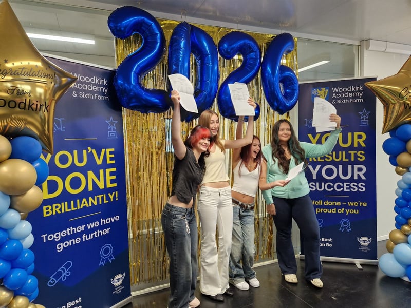 Students celebrate as they collect their grades at Woodkirk Academy in Tingley