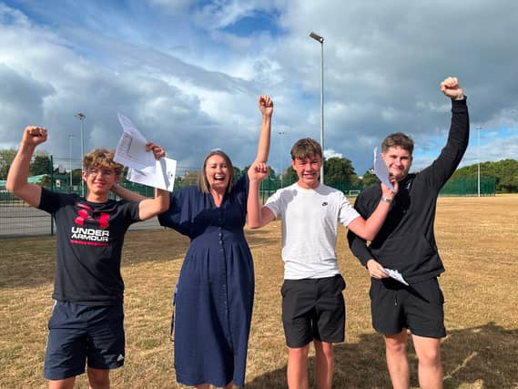 GCSE Results Day: King's Academy Brune Park
Pictured: Headteacher of King’s Academy Brune Park, Kerry Payne, with Gethin Jones, Oscar Munns and Shay Faver (left to right).
Picture: Sarah Standing