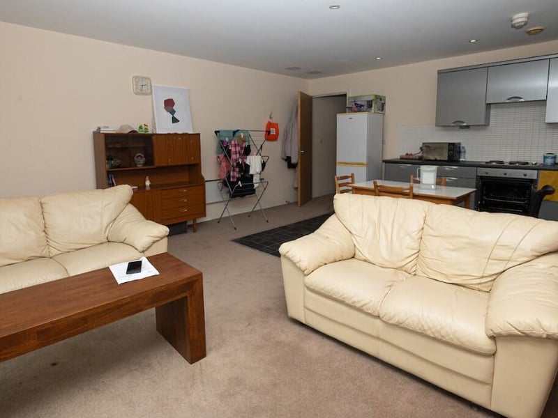 The lounge is carpeted and cosy 