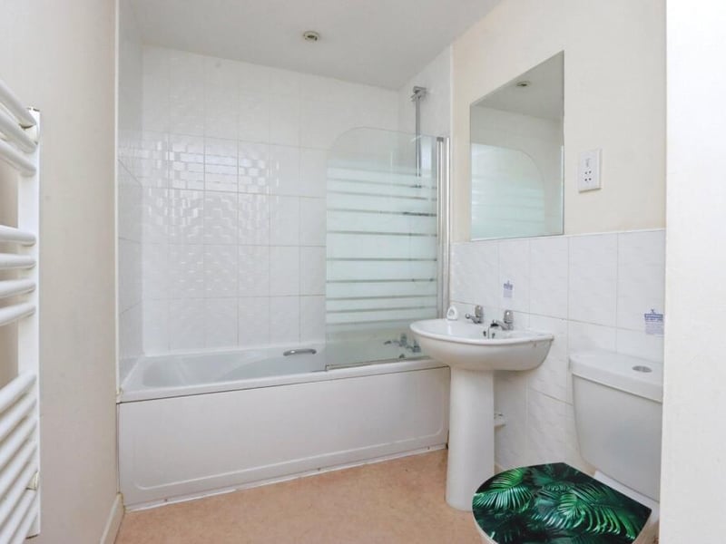 The bathroom features a shower and bath, which can be rare in one-bed accommodation