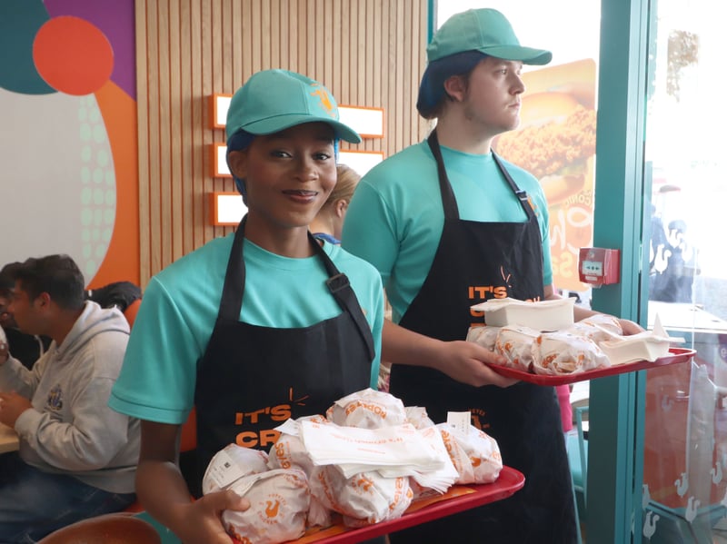 Staff gave away free sandwiches at the opening.