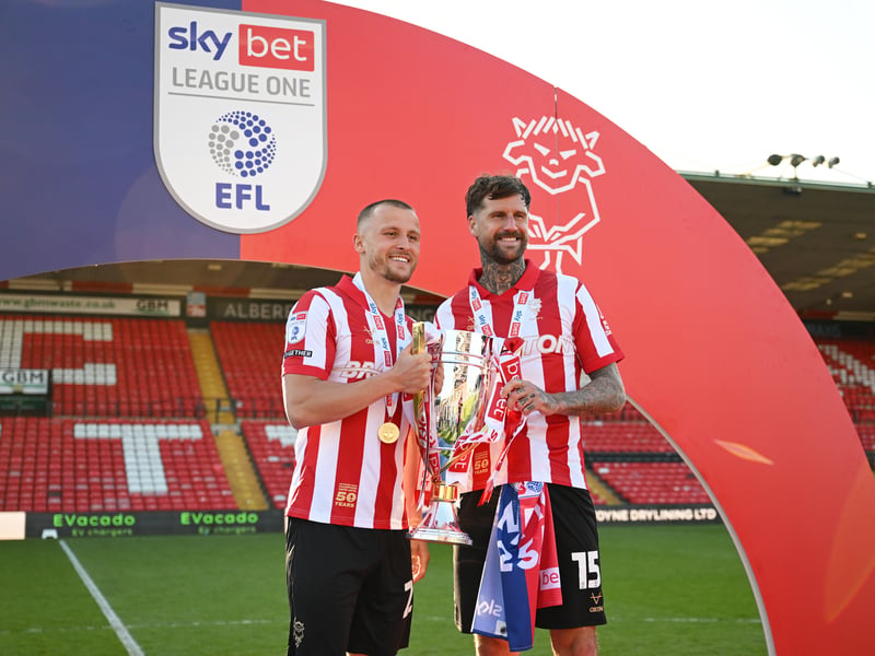 The former Pompey defender will miss this afternoon's contest at Sincil Bank as he continues to sit out with a knee issue.