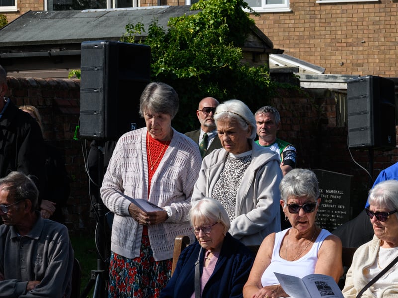 Members of the public listen on at the Freckleton Air Disaster Memorial at Holy Trinity Church. Photo: Kelvin Lister-Stuttard