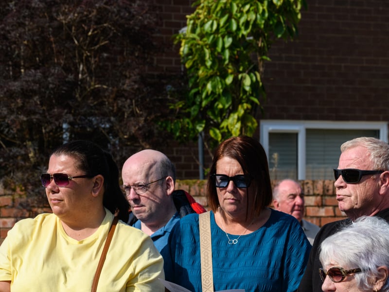 Members of the public listen on at the Freckleton Air Disaster Memorial at Holy Trinity Church. Photo: Kelvin Lister-Stuttard