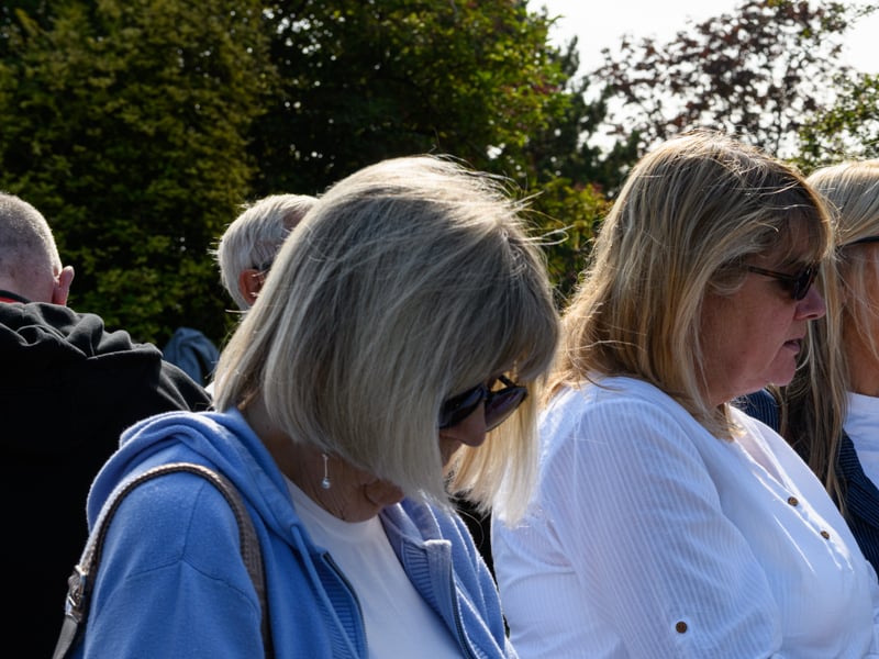 Members of the public listen on at the Freckleton Air Disaster Memorial at Holy Trinity Church. Photo: Kelvin Lister-Stuttard