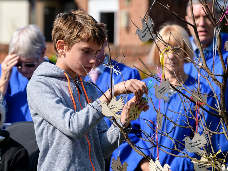 Doves bearing the name of those who died at the Freckleton Air Disaster are placed on a tree at Holy Trinity Church in remembrance. Photo: Kelvin Lister-Stuttard