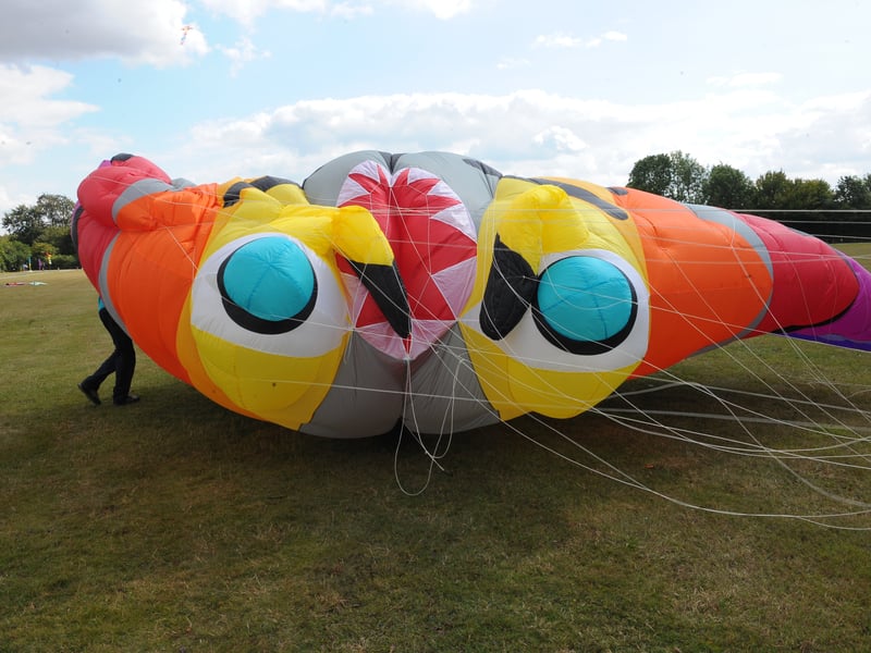 One of the giant kites struggles due to a lack of wind on Saturday.