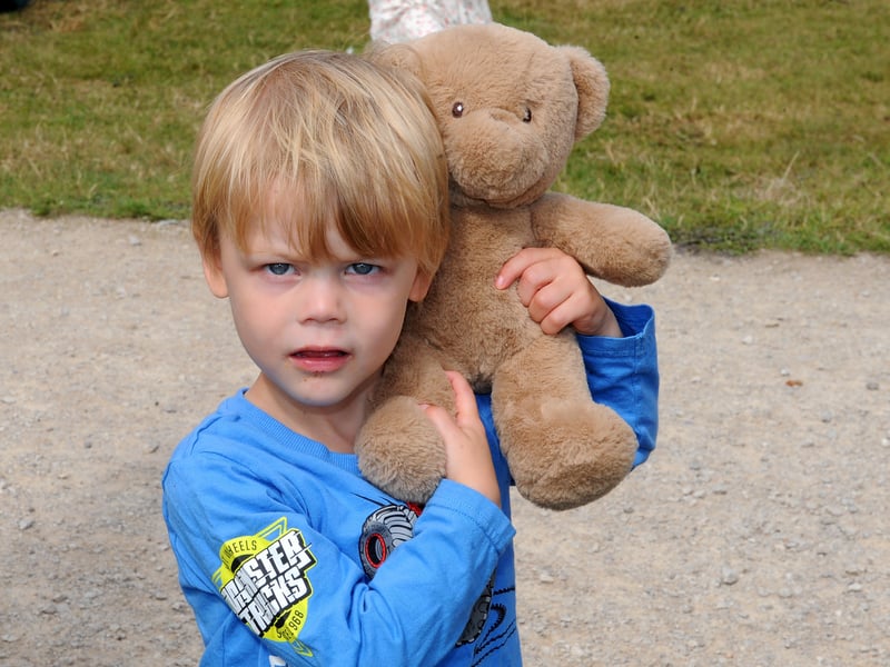 Ethan Slater, 3, of Micklefield, with his teddy after the parachute drop.