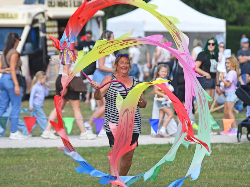 Debs Savage shows her skills with a Dragon Poi.