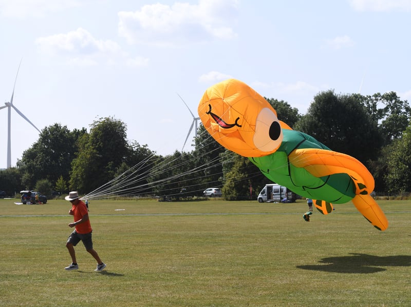 A backdrop of wind turbines at the festival.