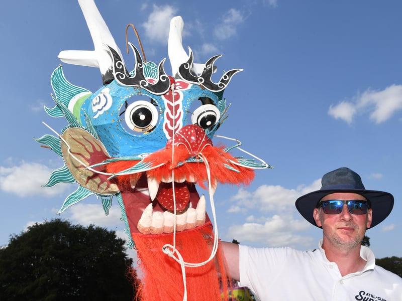 Tom Potts with his traditional dragon kite made from silk and bamboo.